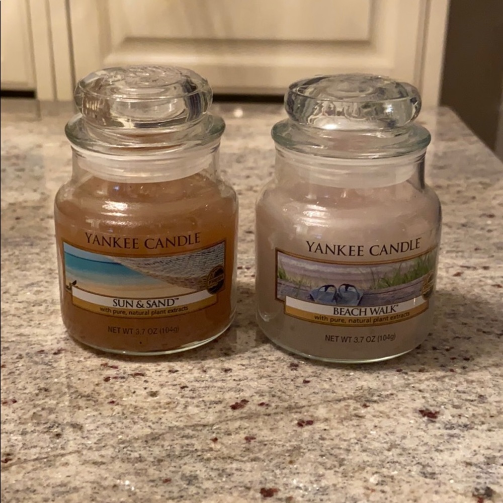 Yankee Candles one burnt once - one never used